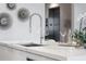 Modern kitchen sink with a sleek chrome faucet at 1591 Gulf Of Mexico Dr # 515, Longboat Key, FL 34228