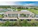 Aerial view of condo building with parking and amenities at 175 Kings Hwy # B-2, Punta Gorda, FL 33983