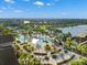 Resort-style pool with expansive sundeck and lush landscaping at 17802 Eastbrook Ter, Lakewood Ranch, FL 34202