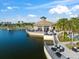 Community clubhouse with lakeside patio and stunning water views at 17802 Eastbrook Ter, Lakewood Ranch, FL 34202