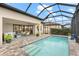 Inviting in-ground pool area featuring brick pavers and comfortable lounge seating at 17802 Eastbrook Ter, Lakewood Ranch, FL 34202