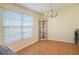 Simple dining area with hardwood floors and built-in hutch at 3415 59Th W Ave, Bradenton, FL 34210