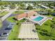 Aerial view of community pool, shuffleboard, and parking at 3812 42Nd Street W Ct, Bradenton, FL 34205