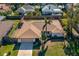 Aerial view of a single-story home with a fenced backyard and attached garage at 4434 Meadow Creek Cir, Sarasota, FL 34233