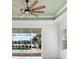 Bedroom with sliding doors to the pool area at 4704 Foxtail Dr, Parrish, FL 34219