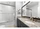 Bathroom with double vanity, granite countertop and a tub shower combo at 4704 Foxtail Dr, Parrish, FL 34219