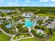 Aerial view of community pool and clubhouse at 4704 Foxtail Dr, Parrish, FL 34219