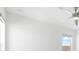 Bedroom with gray carpet, ceiling fan and window with a view at 4704 Foxtail Dr, Parrish, FL 34219