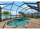 Enjoy the screened pool and stunning lake view at 4704 Foxtail Dr, Parrish, FL 34219