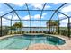 Relaxing screened pool with lake view at 4704 Foxtail Dr, Parrish, FL 34219