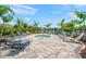 Relaxing community pool with hot tub and lounge chairs at 4704 Foxtail Dr, Parrish, FL 34219