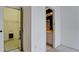 Bedroom with mirrored closet and access to bathroom at 508 Woodstork Cir, Bradenton, FL 34209