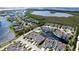 Aerial view of waterfront community with pool and private patio at 508 Woodstork Cir, Bradenton, FL 34209