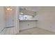 Entryway with view into the kitchen and living room at 508 Woodstork Cir, Bradenton, FL 34209