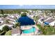 Aerial view of waterfront property with pool and patio at 508 Woodstork Cir, Bradenton, FL 34209