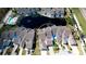 Aerial view showcasing the villa's location near a lake at 508 Woodstork Cir, Bradenton, FL 34209