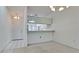 Simple dining area with kitchen views and carpet flooring at 508 Woodstork Cir, Bradenton, FL 34209