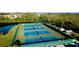 Community tennis courts with surrounding landscape at 508 Woodstork Cir, Bradenton, FL 34209