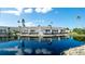 Waterfront property featuring multiple townhouses with private decks at 508 Woodstork Cir, Bradenton, FL 34209