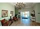 Elegant lobby with seating area and access to outdoor amenities at 508 Woodstork Cir, Bradenton, FL 34209