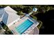 Community pool with surrounding deck and lounge chairs at 508 Woodstork Cir, Bradenton, FL 34209