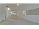 Open living room and kitchen area with high ceilings at 508 Woodstork Cir, Bradenton, FL 34209