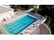 Community pool with plenty of deck space for lounging at 508 Woodstork Cir, Bradenton, FL 34209