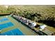 Kayaks stored near the tennis courts at 508 Woodstork Cir, Bradenton, FL 34209