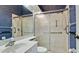 Bathroom with walk-in shower and grab bars at 508 Woodstork Cir, Bradenton, FL 34209