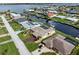 Aerial view of waterfront homes with private docks and pools at 5234 Cooper Ter, Port Charlotte, FL 33981