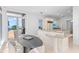 Kitchen with breakfast nook, granite counters, and access to backyard pool at 5919 Gulf Of Mexico Dr, Longboat Key, FL 34228