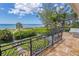 Oceanfront balcony with tile flooring and ornate railing at 5919 Gulf Of Mexico Dr, Longboat Key, FL 34228