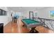 Spacious game room featuring a pool table and seating area at 5919 Gulf Of Mexico Dr, Longboat Key, FL 34228