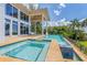 Inviting infinity pool and spa with expansive patio and ocean views at 5919 Gulf Of Mexico Dr, Longboat Key, FL 34228