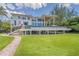Elevated home with large pool and backyard at 5919 Gulf Of Mexico Dr, Longboat Key, FL 34228