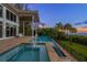 Relaxing pool and spa area with ocean views at 5919 Gulf Of Mexico Dr, Longboat Key, FL 34228