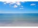 Peaceful ocean view with calm water and blue skies at 5919 Gulf Of Mexico Dr, Longboat Key, FL 34228