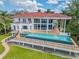 Luxury beachfront home with large pool and patio at 5919 Gulf Of Mexico Dr, Longboat Key, FL 34228