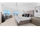 Main bedroom with ocean views, private balcony and workspace at 5919 Gulf Of Mexico Dr, Longboat Key, FL 34228