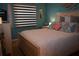 Bright bedroom with a queen-size bed and decorative pillows at 7201 29Th Avenue W Dr # 306, Bradenton, FL 34209