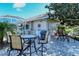 Community patio with seating and grill at 9630 Club South Cir # 6303, Sarasota, FL 34238