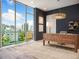 Modern office design with a large window view, stylish desk, and sleek decor at 111 Golden Gate Pt # 602, Sarasota, FL 34236