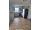 Bright kitchen featuring stainless steel appliances, modern gray cabinets, and granite countertops at 1308 72Nd E St, Palmetto, FL 34221
