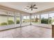 Sunroom with golf course views and a relaxing atmosphere at 1420 Turnberry Dr, Venice, FL 34292