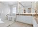 Spa-like bathroom with soaking tub and glass shower at 1516 S Orange Ave, Sarasota, FL 34239