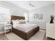 Relaxing bedroom with a comfortable bed, nightstands, and plenty of natural light at 1516 S Orange Ave, Sarasota, FL 34239