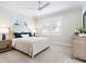 Bright bedroom with a comfortable bed, plenty of natural light, and neutral decor at 1516 S Orange Ave, Sarasota, FL 34239