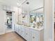 Bright entryway with built-in storage and large mirrors at 1516 S Orange Ave, Sarasota, FL 34239