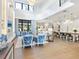 Open floor plan living room and kitchen with high ceilings and hardwood floors at 1516 S Orange Ave, Sarasota, FL 34239