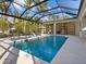 Resort-style pool with spa and covered patio at 1516 S Orange Ave, Sarasota, FL 34239